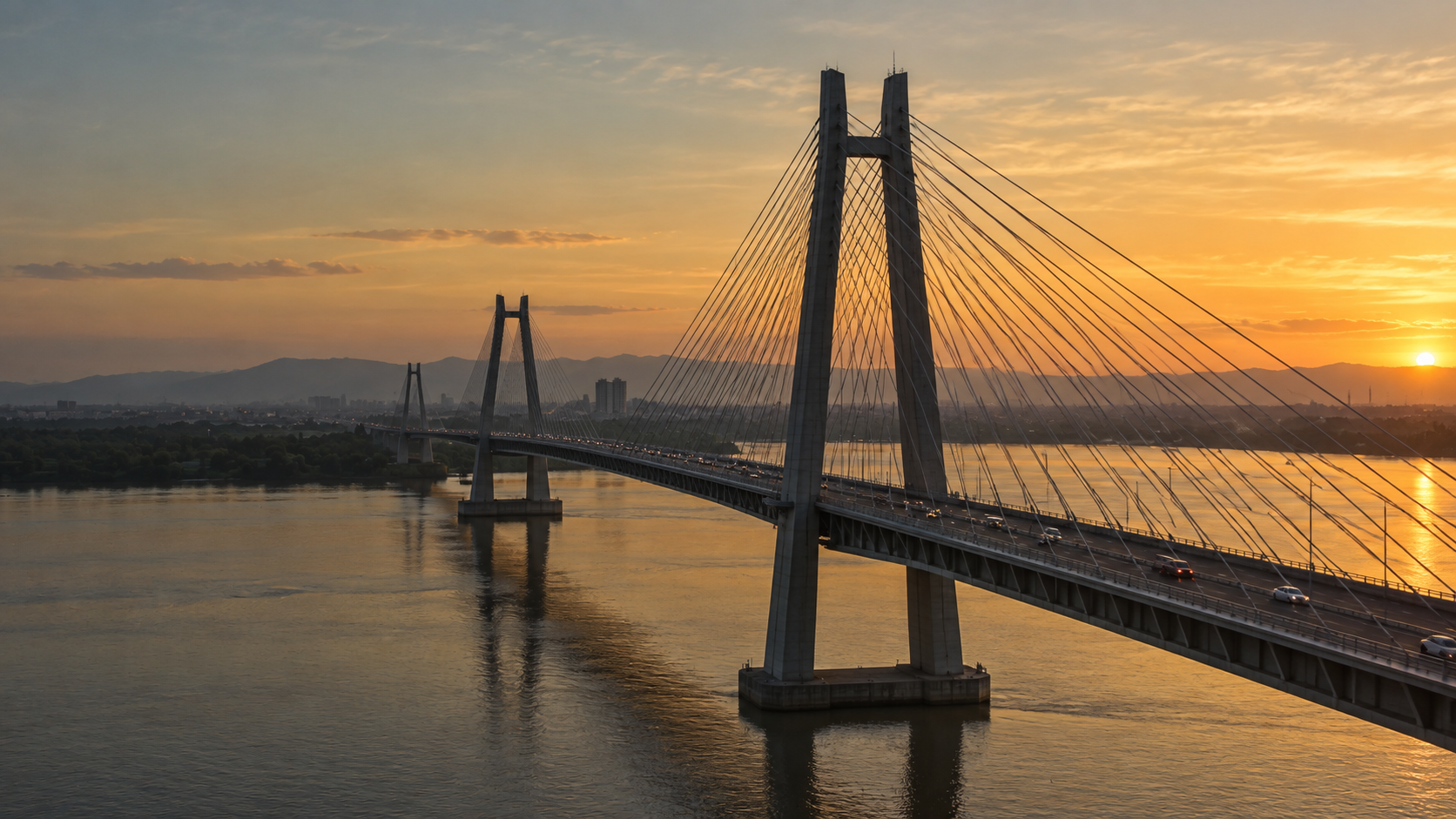 Imagen ilustrativa de un puente al atardecer que conecta dos orillas.